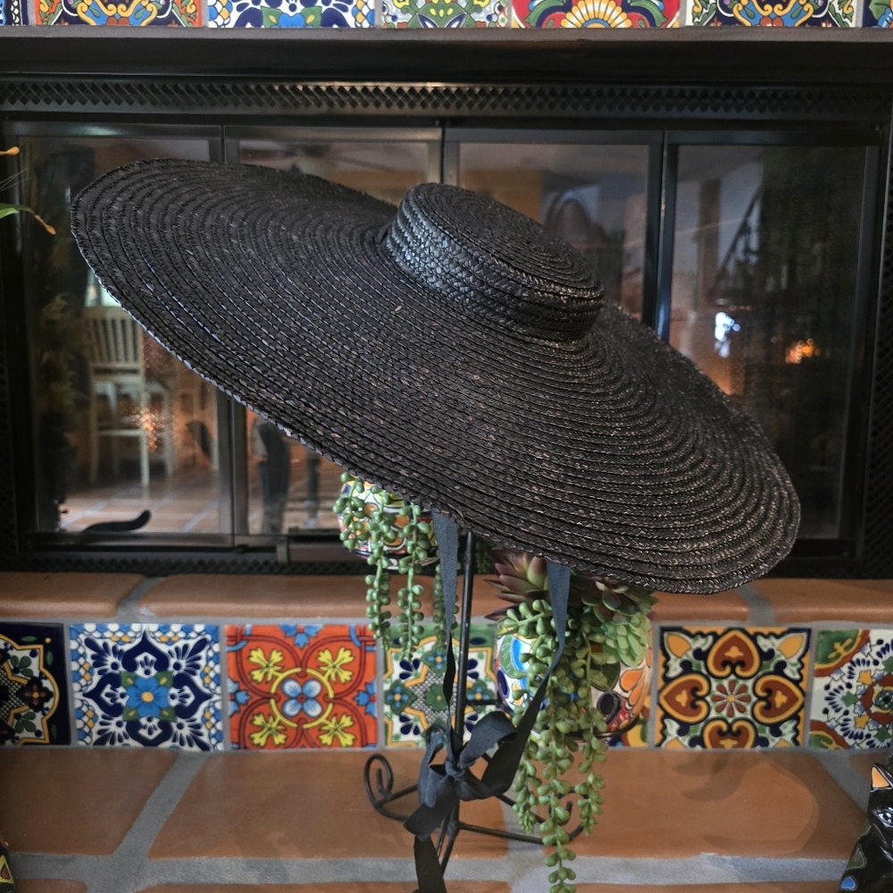 Elegant Black Woven Hat by [Brand]